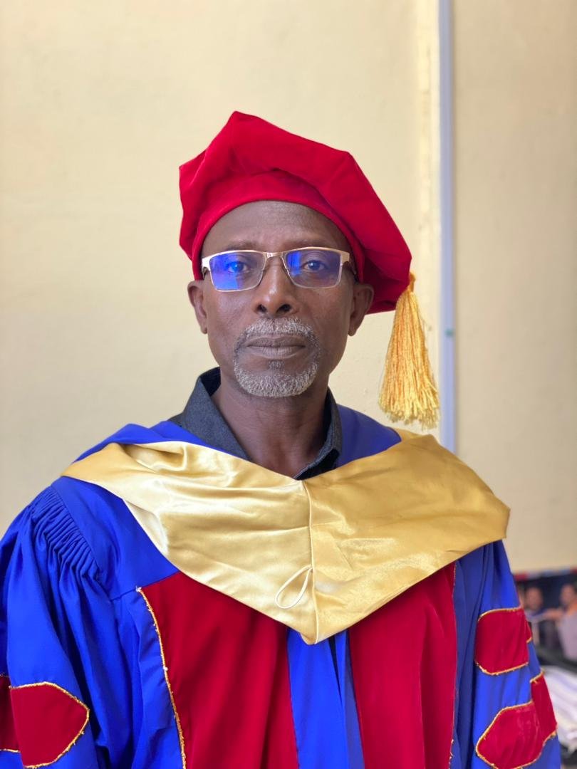 Portrait of Dr. Eric Achiri Mongo
